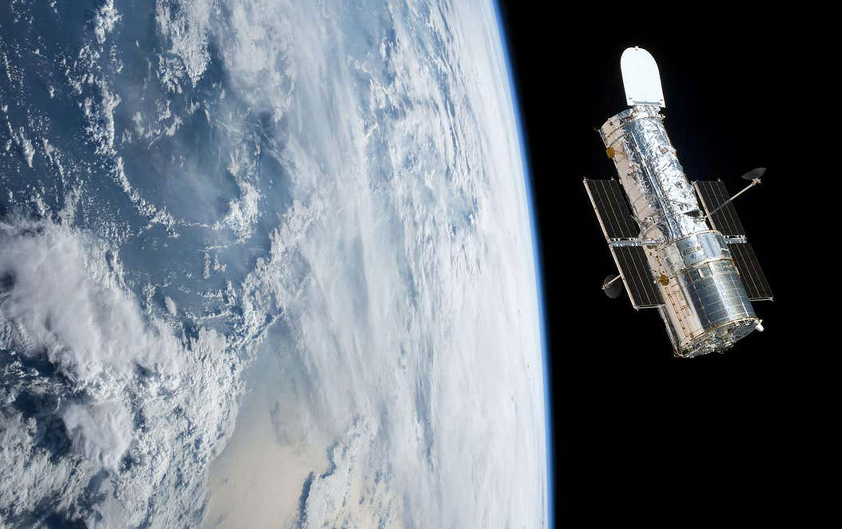 Hubble Space Telescope Discoveries: Age of the Universe, Pluto’s Two Moons, and More